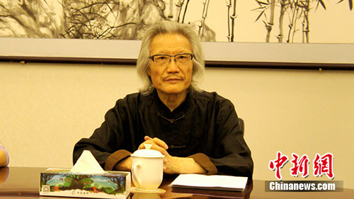 蕭玉田講述郵票創(chuàng)作故事。中國集郵總公司 供圖