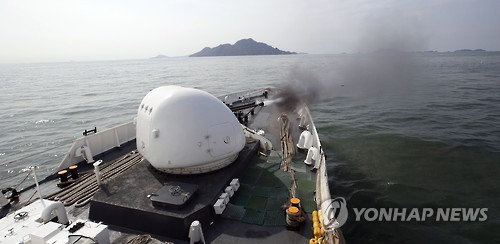資料圖：韓海警對中國漁船執(zhí)法首次使用機槍射擊。