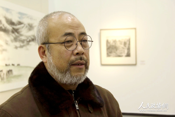 人民政協(xié)報社《畫界》雜志主編劉根長接受媒體采訪。