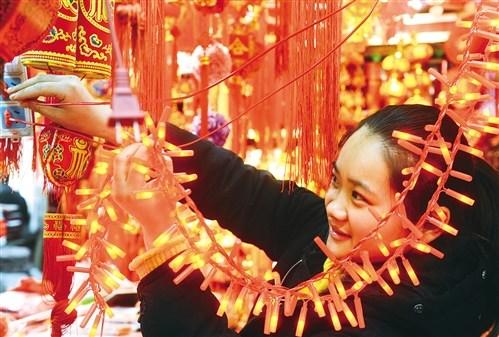 春節(jié)消費紅紅火火：民樂奏響中國風網(wǎng)購年貨成潮流