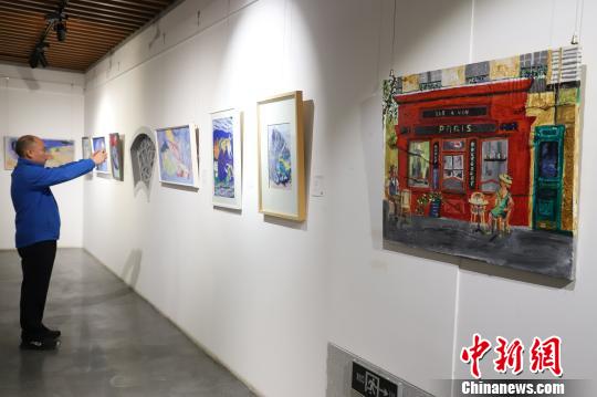 圖為展覽活動現(xiàn)場?！■暮陚?攝