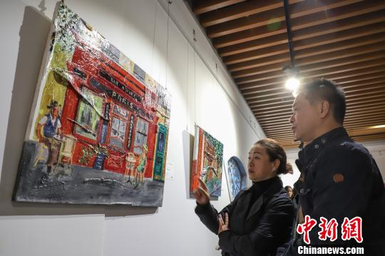 圖為展覽活動現(xiàn)場?！■暮陚?攝